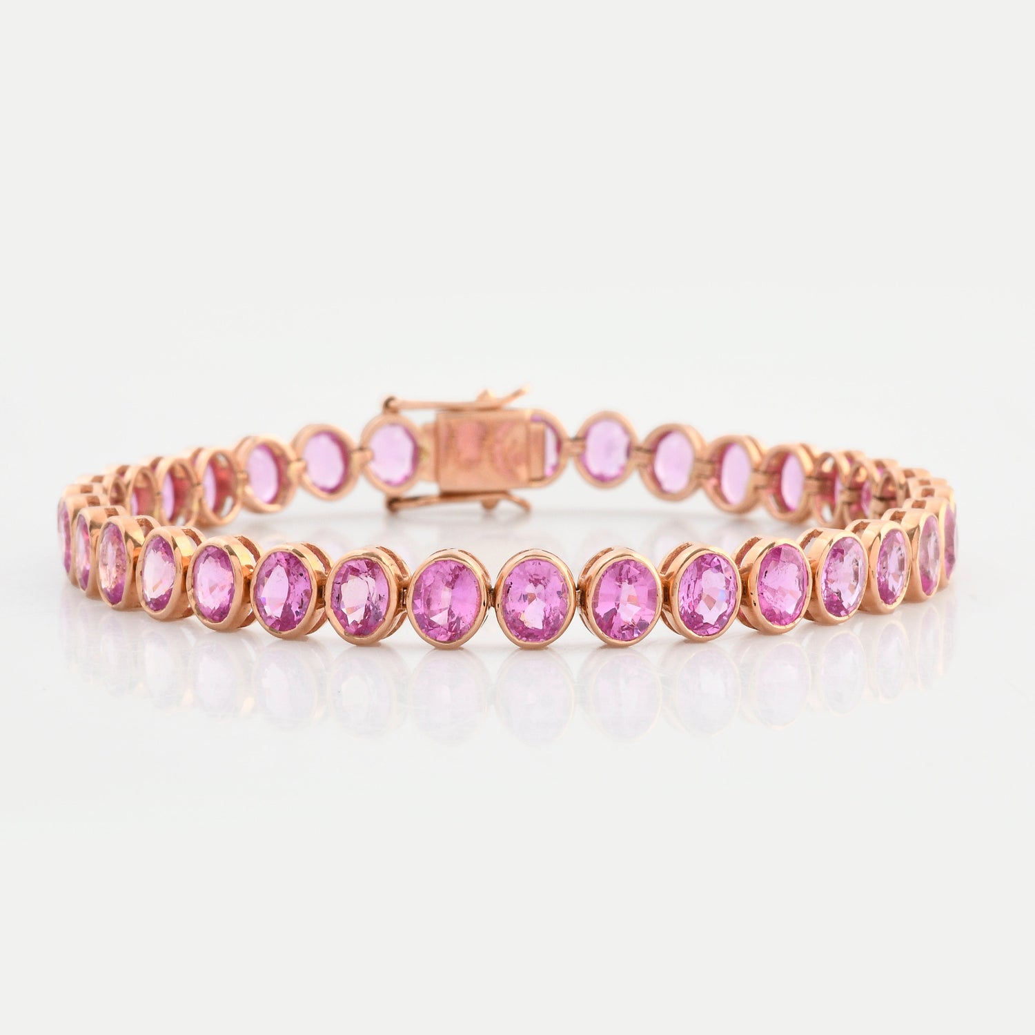 Pink Sapphire Oval Bezel Set Tennis Bracelet