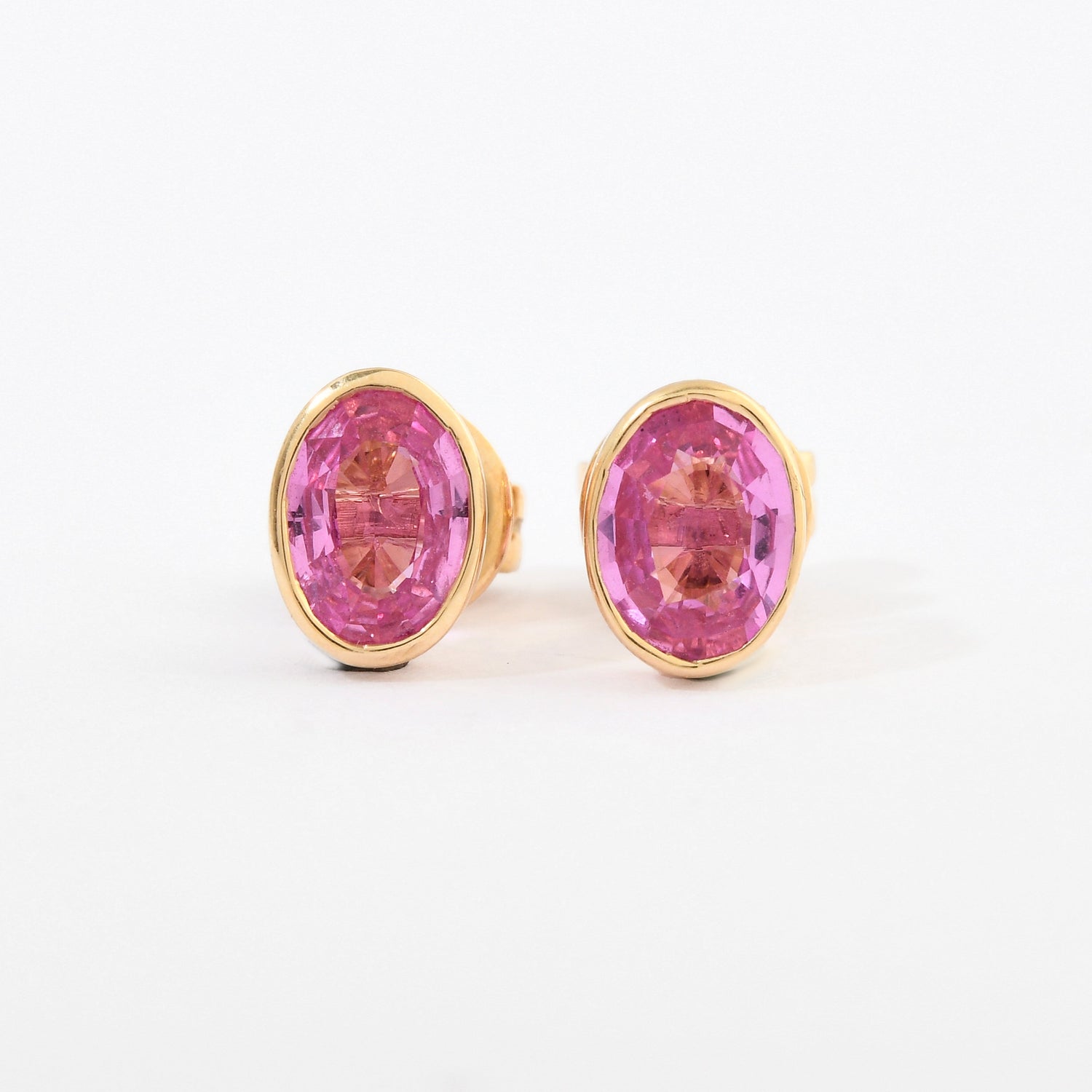 Pink Sapphire Oval Bezel Set Studs