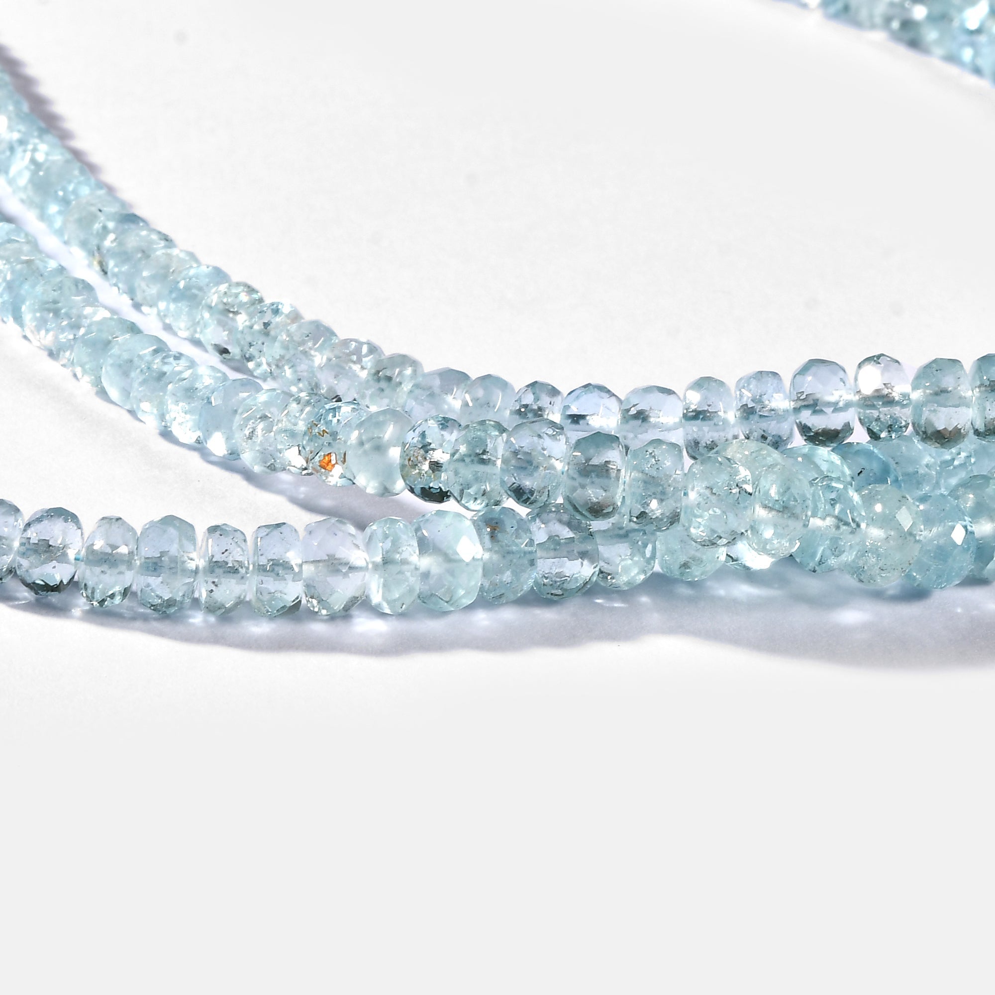 AQUAMARINE FACETED ROUNDEL 4-8 MM - 1 STRAND - 40 CM