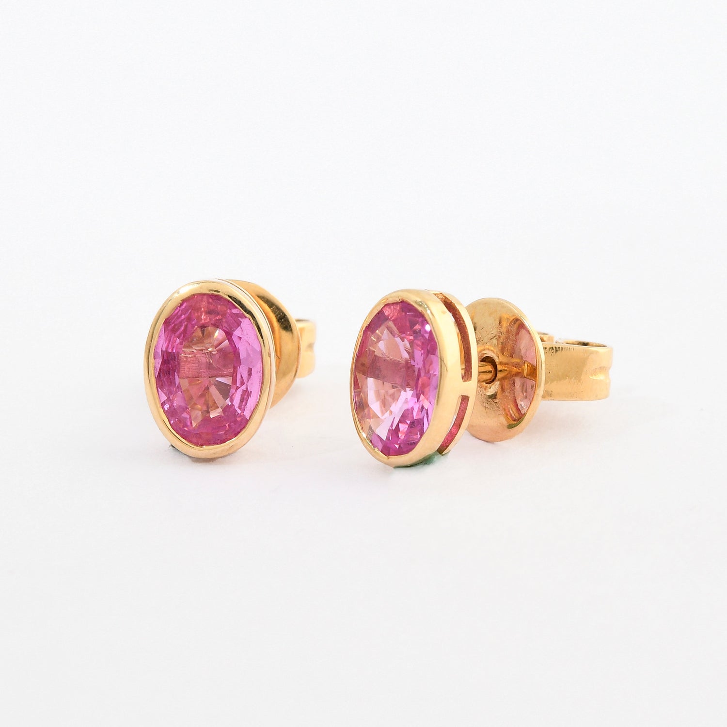 Pink Sapphire Oval Bezel Set Studs