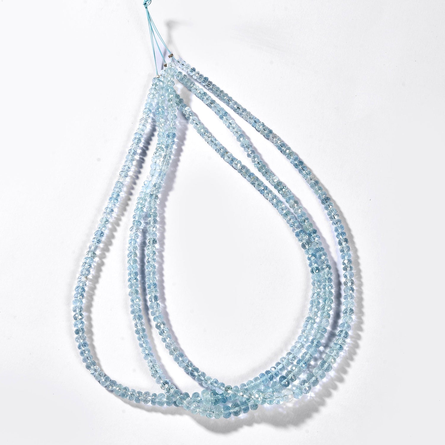 AQUAMARINE FACETED ROUNDEL 4-8 MM - 1 STRAND - 40 CM